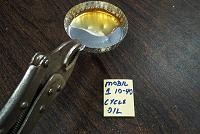 Aluminium chemistry dish with flame heating contents